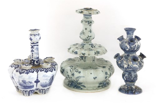 Lot 553 - A Cantagalli faience blue and white candlestick