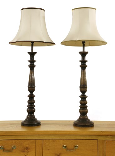 Lot 551 - A pair of turned and stained wood table lamps