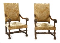 Lot 548 - A pair of French walnut open armchairs