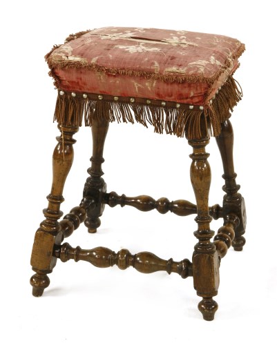 Lot 536 - A Continental walnut footstool