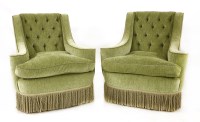 Lot 877 - A pair of Howard Chair Ltd. green velvet armchairs