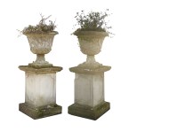 Lot 1038 - A pair of Haddonstone urns