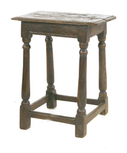 Lot 839 - An oak joined stool