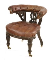 Lot 602 - An early Victorian mahogany and leather button upholstered chair