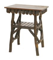 Lot 843 - An elm-topped branch table