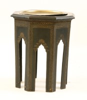 Lot 532 - An Indian ebonised table