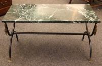Lot 589 - A green marble topped low table