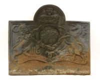 Lot 576 - A cast iron fire back with central crest in relief 

Provenance: From the estate of the late Henry Wilson
