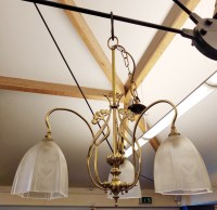 Lot 367A - An Art Nouveau brass three light electrolier