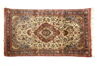 Lot 357 - A silk Kashan rug