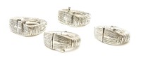 Lot 118 - A collection of four Indian silver bangles