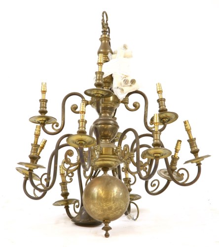 Lot 286 - A brass Dutch twelve light chandelier