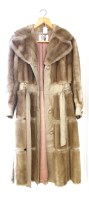 Lot 218 - A ladies faux fur and leather coat