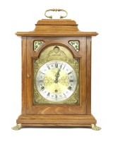 Lot 273 - A 20th Century oak cased eight day bracket clock