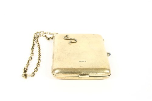 Lot 139 - An Edwardian silver gilt purse compact aide memoire