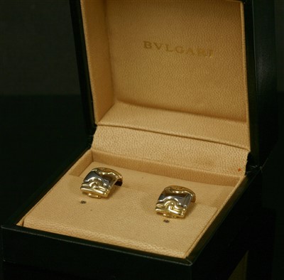 Lot 416 - A pair of gold diamond set 'C' shaped earrings