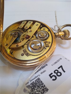 Lot 587 - A Swiss gold side wind Hunter pocket watch