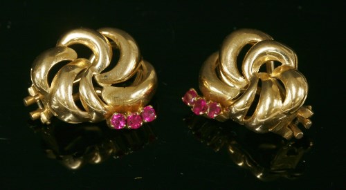 Lot 232 - A pair of Italian gold and synthetic ruby earrings with an open scrolling spray