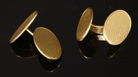 Lot 197 - A pair of Continental gold swivel plate link cufflinks