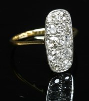 Lot 167 - An Art Deco diamond set fingerline plaque ring