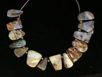 Lot 254 - A 9ct gold boulder opal necklace