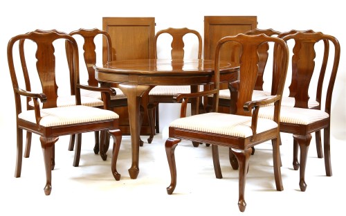Lot 332 - A 20th century Queen Anne style dining table and eight chairs