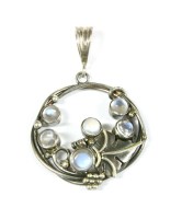 Lot 81 - A silver Art Nouveau style moonstone circular pendant