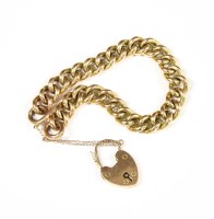 Lot 87 - A 9ct gold hollow curb link bracelet with padlock