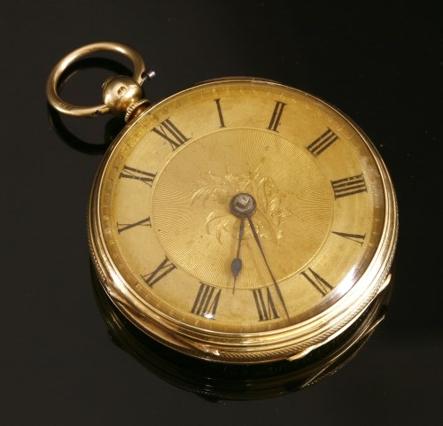 Lot 580 - An 18ct gold key wound open faced pocket watch