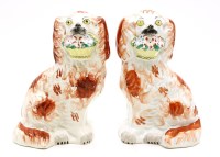 Lot 198 - A pair of Staffordshire pottery spaniels