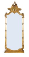 Lot 411 - A large Continental beech framed pier mirror