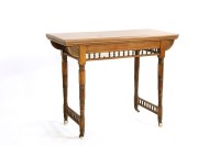 Lot 402 - A Victorian aesthetic fold over card table