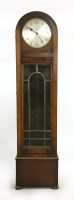 Lot 465 - An early 20th century oak eight day grandmother clock