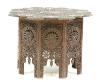 Lot 742 - An Indian carved teak table