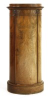 Lot 975 - A mahogany oval pedestal cupboard