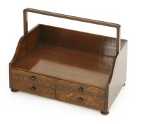 Lot 803 - A mahogany four-drawer book carrier
