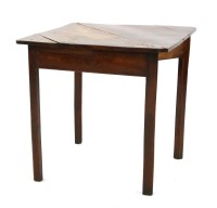 Lot 646 - A George III elm corner table