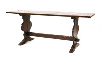 Lot 559 - An oak refectory table