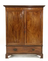 Lot 527 - A mahogany linen press