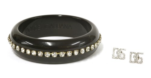 Lot 162 - A Dolce and Gabbana black resin bangle