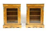 Lot 513 - A pair of Victorian walnut display cabinets