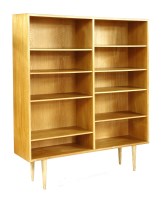 Lot 383 - A Danish oak veneered open bookcase
