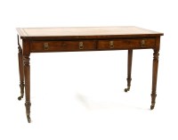 Lot 406 - An early 19th century mahogany writing table
