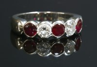 Lot 517 - A platinum five stone ruby and diamond half eternity ring
