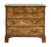 Lot 813 - A walnut chest of drawers