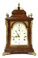Lot 978 - A walnut bracket clock