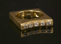 Lot 248 - A gold five stone diamond set square shaped ring