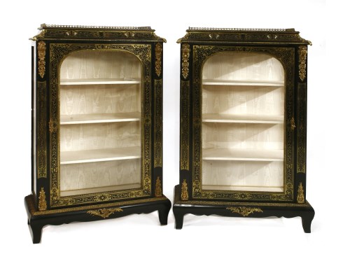 Lot 961 - A pair of boullework ebony and brass inlaid display cabinets