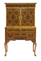 Lot 848 - A William and Mary walnut oyster veneered and sycamore banded cabinet