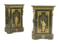 Lot 787 - A pair of French ebonised and gilt bronze mounted pier cabinets